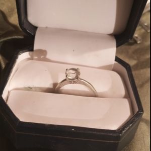 White gold white sapphire engagement ring